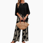 Set elegant cu top cu mâneci trei sferturi și pantaloni cu model