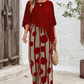 Set elegant cu top cu mâneci trei sferturi și pantaloni cu model
