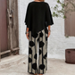 Set elegant cu top cu mâneci trei sferturi și pantaloni cu model